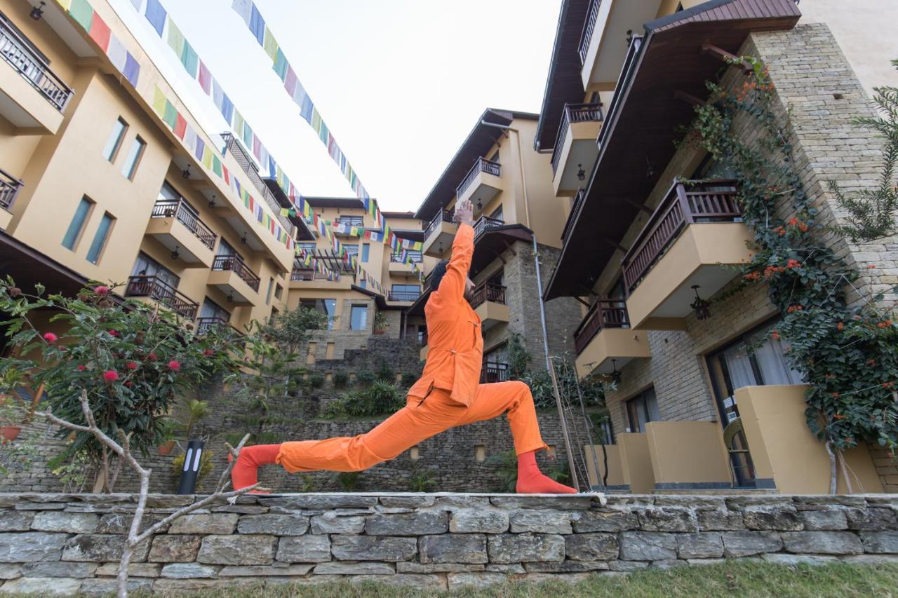 Bar Peepal Resort Pokhara Eksteriør bilde A student of the Drepung Loseling Nunnery, practicing yoga.