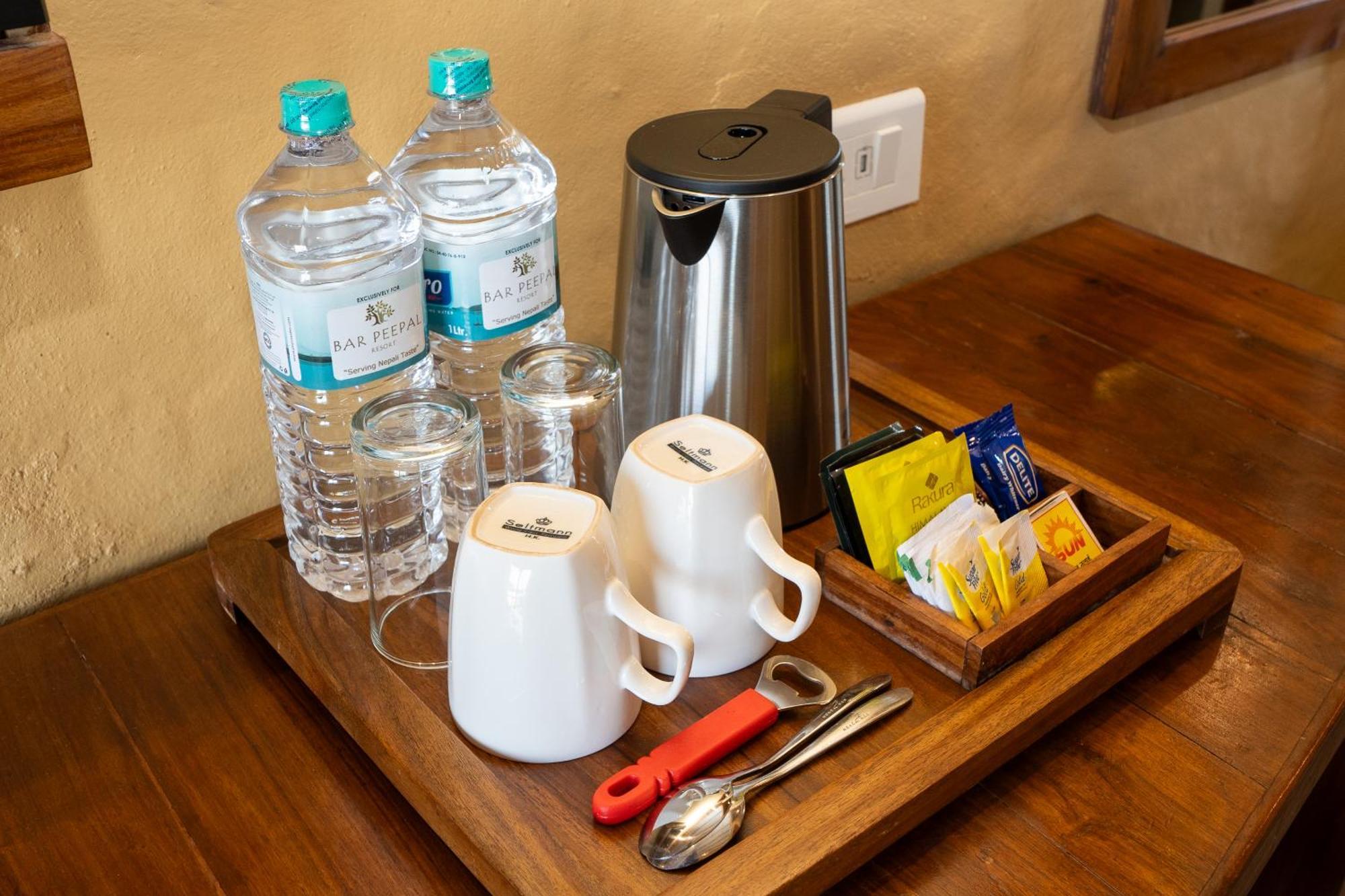 Bar Peepal Resort Pokhara Eksteriør bilde A tea tray